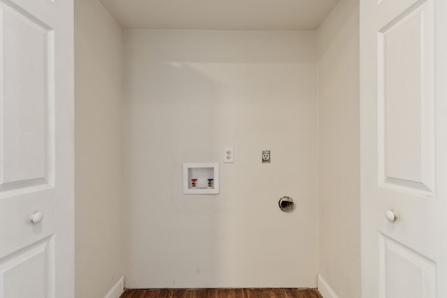 clothes washing area featuring washer hookup, laundry area, dark wood-style flooring, and electric dryer hookup