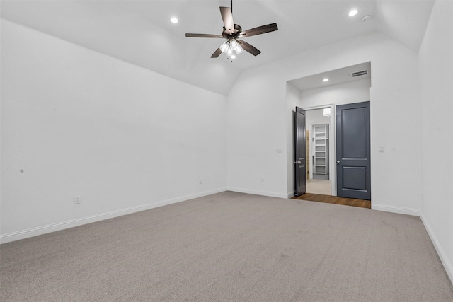 unfurnished room featuring baseboards, visible vents, recessed lighting, ceiling fan, and vaulted ceiling