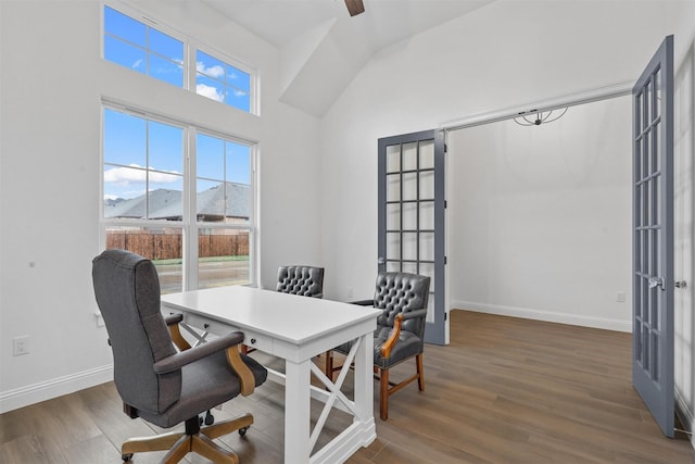 home office featuring a ceiling fan, wood finished floors, baseboards, and french doors