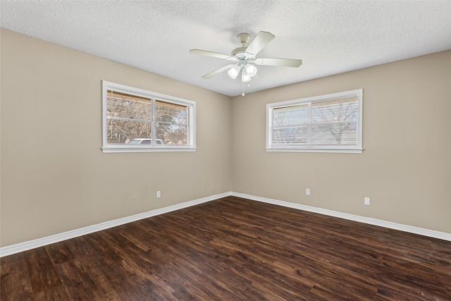 6305 Chapman Dr, Greenville, TX 75402 - spare room featuring plenty of natural light, wood finished floors, baseboards, a textured ceiling, and ceiling fan