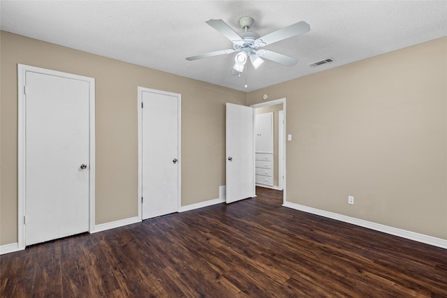 6305 Chapman Dr, Greenville, TX 75402 - unfurnished bedroom with wood finished floors, baseboards, and ceiling fan