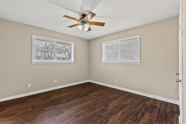 6305 Chapman Dr, Greenville, TX 75402 - empty room featuring wood finished floors, ceiling fan, baseboards, and a textured ceiling