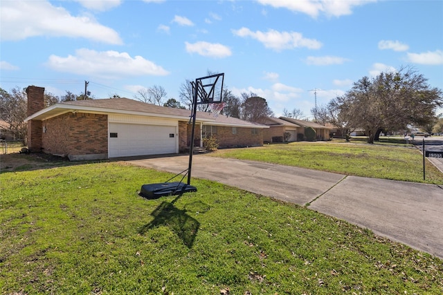 6305 Chapman Dr, Greenville, TX 75402 - view of side of home featuring brick siding, driveway, an attached garage, a lawn, and a chimney