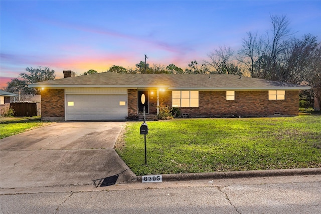 6305 Chapman Dr, Greenville, TX 75402 - single story home featuring a yard, concrete driveway, an attached garage, and brick siding