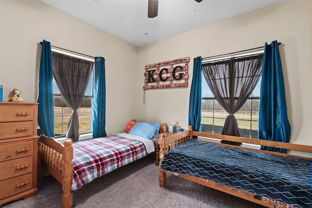 bedroom featuring carpet and a ceiling fan