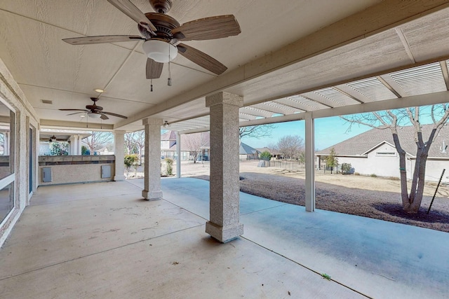 view of patio featuring a pergola and ceiling fan