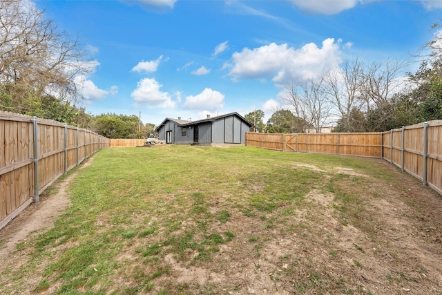 view of yard featuring a fenced backyard