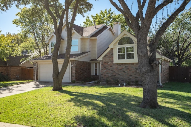 traditional-style house with brick siding, an attached garage, concrete driveway, and fence