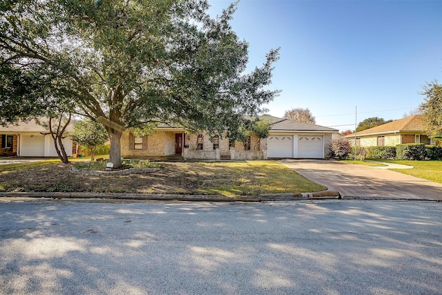 view of front of house with an attached garage and driveway