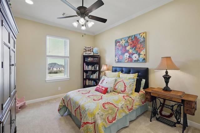 bedroom with light colored carpet, ceiling fan, baseboards, and ornamental molding