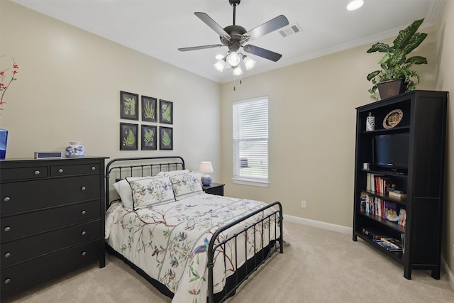 bedroom with visible vents, baseboards, ceiling fan, crown molding, and light colored carpet