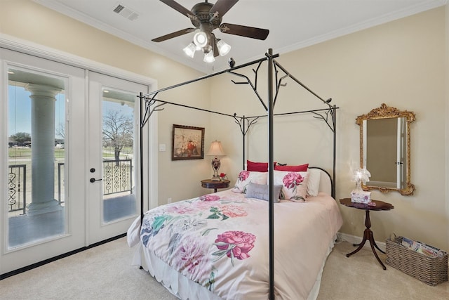 carpeted bedroom featuring access to exterior, visible vents, french doors, and crown molding