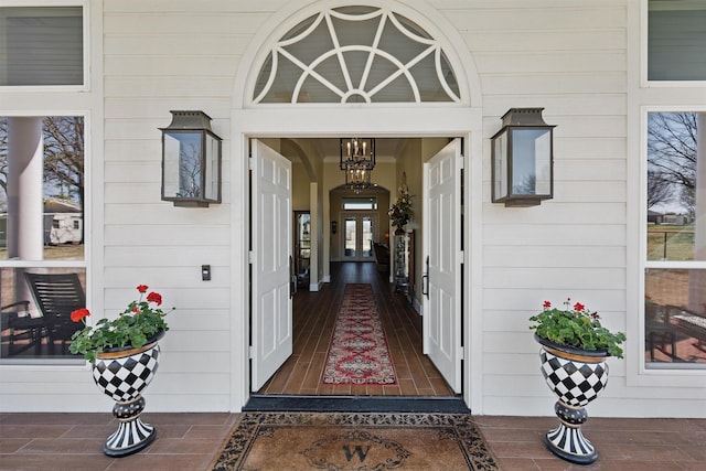 view of exterior entry featuring french doors