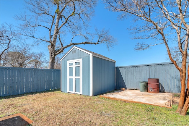 view of shed featuring a fenced backyard