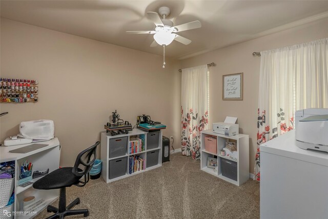 home office featuring carpet floors and ceiling fan