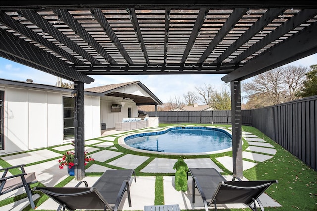 view of pool with a fenced in pool, outdoor lounge area, a fenced backyard, a pergola, and a patio