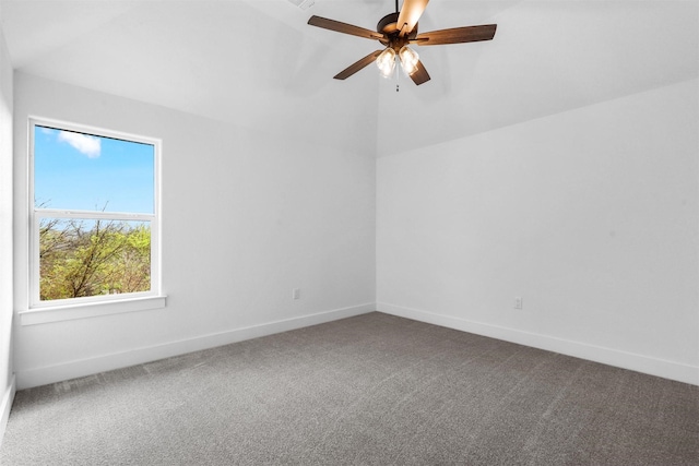 unfurnished room featuring carpet flooring, a ceiling fan, and baseboards