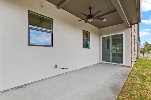 view of patio with ceiling fan