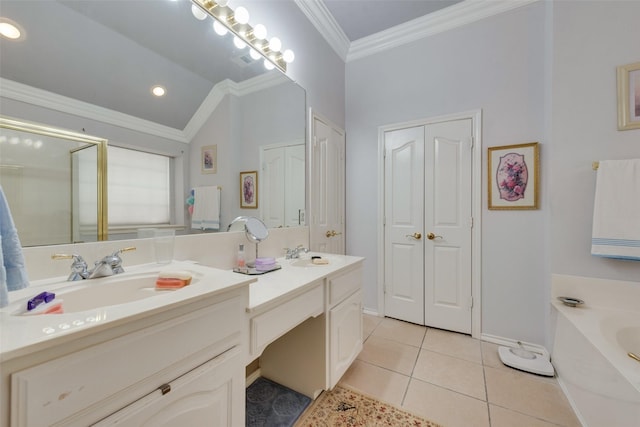 full bath featuring tile patterned floors, ornamental molding, a bath, and a sink