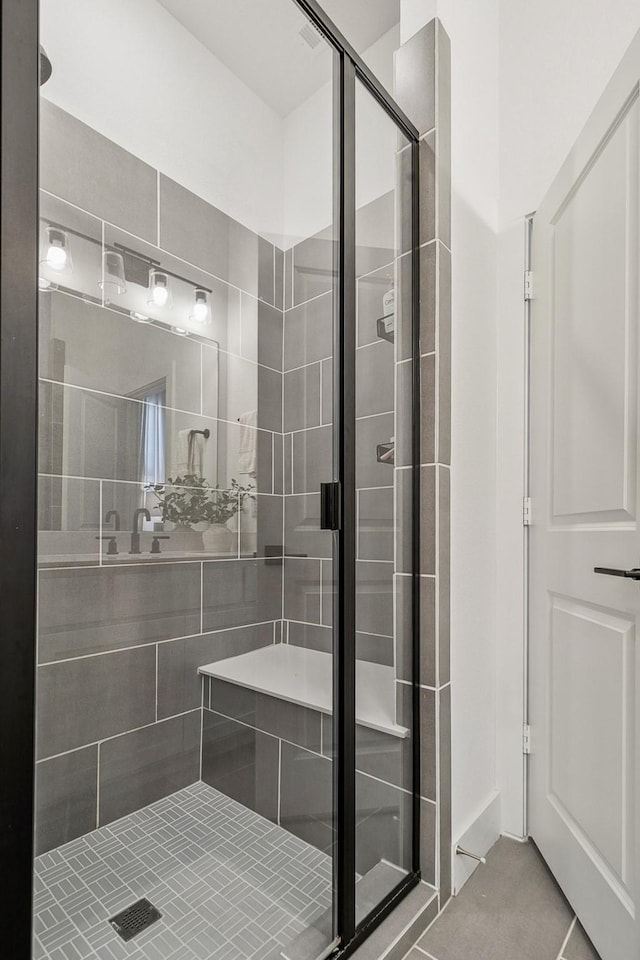 bathroom with a stall shower