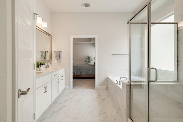 full bathroom featuring visible vents, a stall shower, a bath, marble finish floor, and a sink