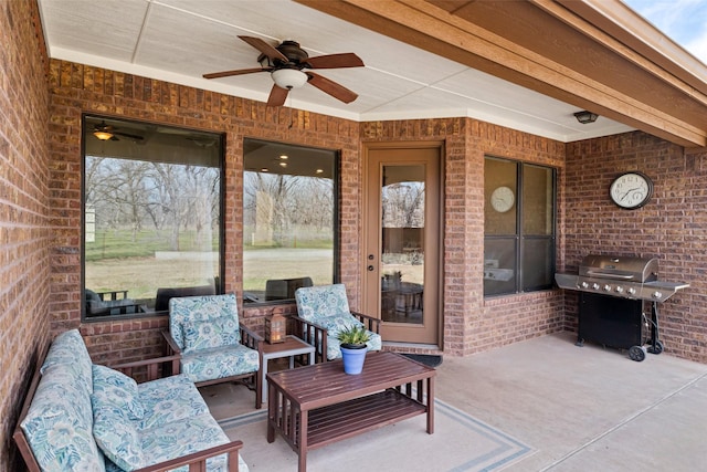 view of patio featuring ceiling fan and grilling area