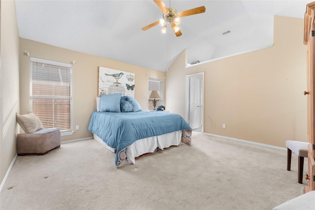 carpeted bedroom with multiple windows and baseboards