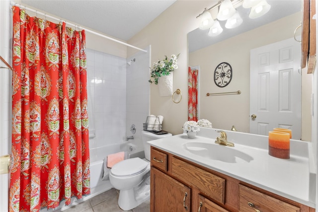 full bath with vanity, tile patterned floors, toilet, and shower / bath combo