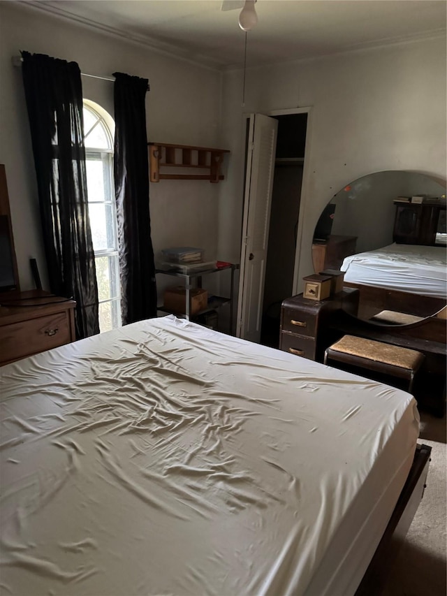 bedroom featuring ornamental molding