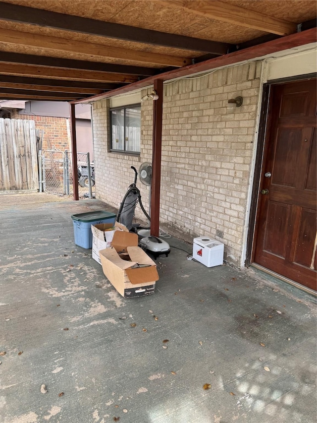 view of patio / terrace featuring fence