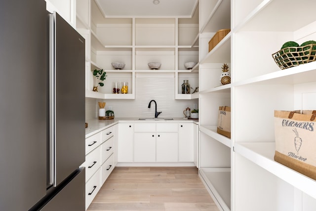 storage area featuring a sink