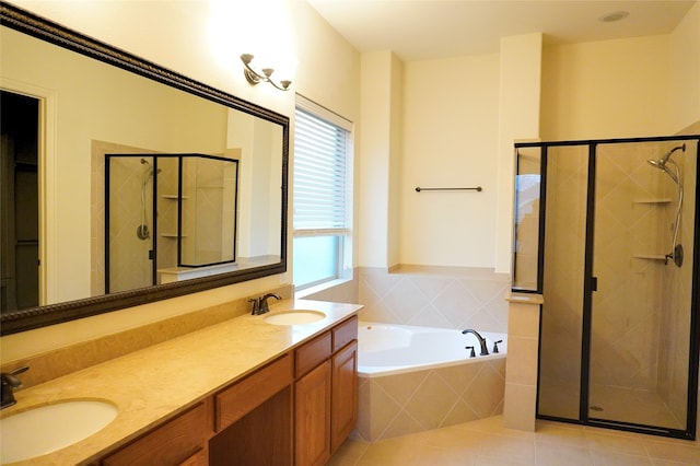 bathroom with a sink, a stall shower, tile patterned flooring, and a bath