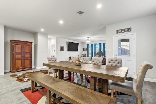 dining room with wood finished floors, visible vents, baseboards, recessed lighting, and ceiling fan