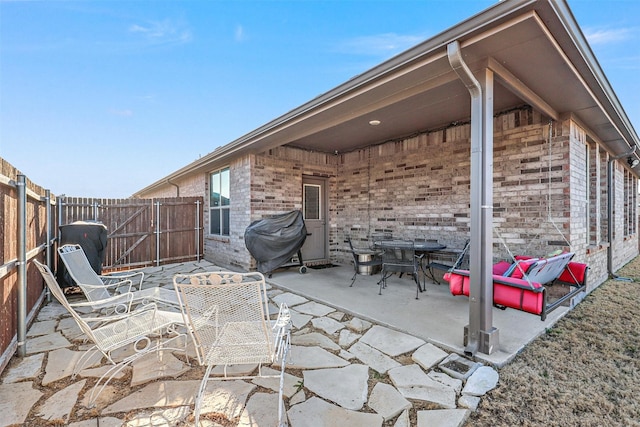 view of patio featuring grilling area and a fenced backyard