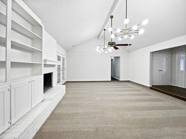 unfurnished living room with a brick fireplace, vaulted ceiling with beams, baseboards, light carpet, and a notable chandelier