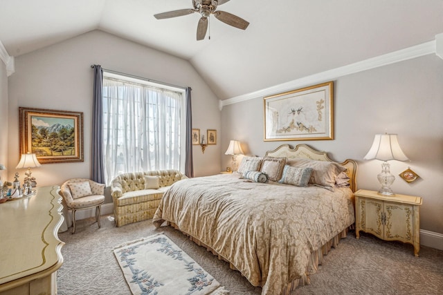 carpeted bedroom with vaulted ceiling, ornamental molding, and ceiling fan