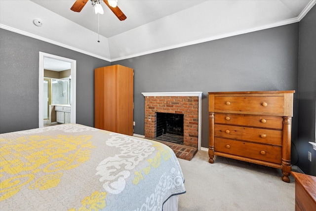 bedroom featuring a brick fireplace, lofted ceiling, ornamental molding, carpet flooring, and a ceiling fan