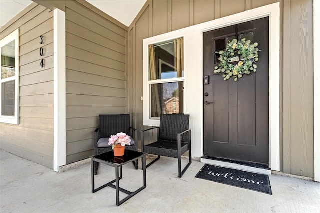 doorway to property with a porch