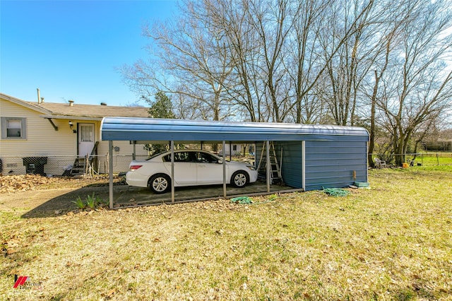 view of car parking with a carport and fence