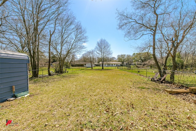 view of yard with fence