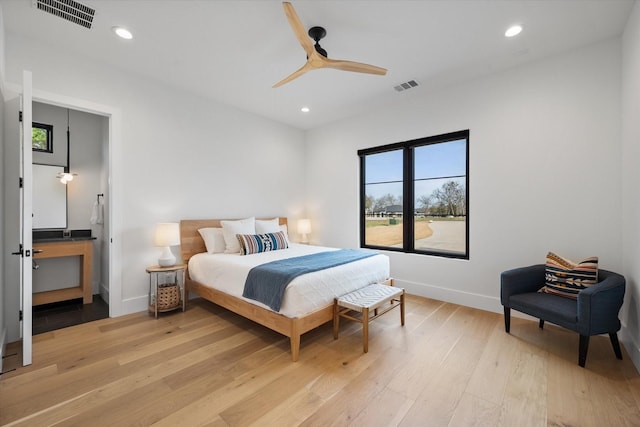 bedroom with recessed lighting, visible vents, and light wood-style flooring