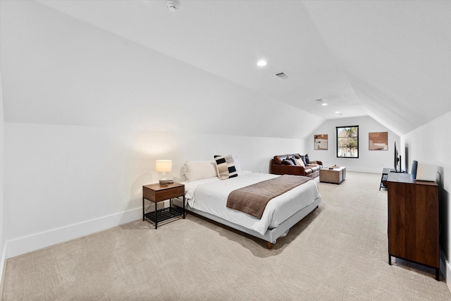 bedroom with light carpet, visible vents, baseboards, and vaulted ceiling