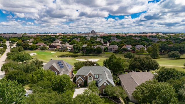 aerial view featuring view of golf course and a residential view