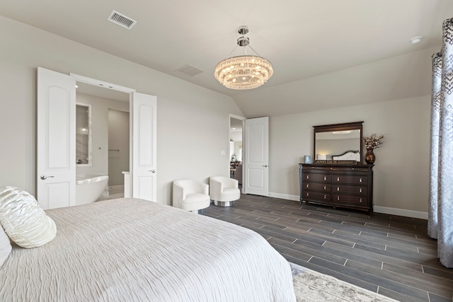 bedroom with wood finish floors, visible vents, baseboards, a chandelier, and vaulted ceiling