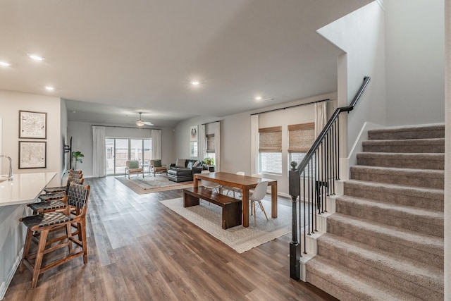 living room with recessed lighting, stairway, dark wood-style floors, and ceiling fan