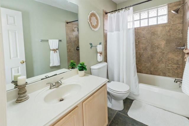 full bathroom featuring vanity, shower / tub combo, and toilet