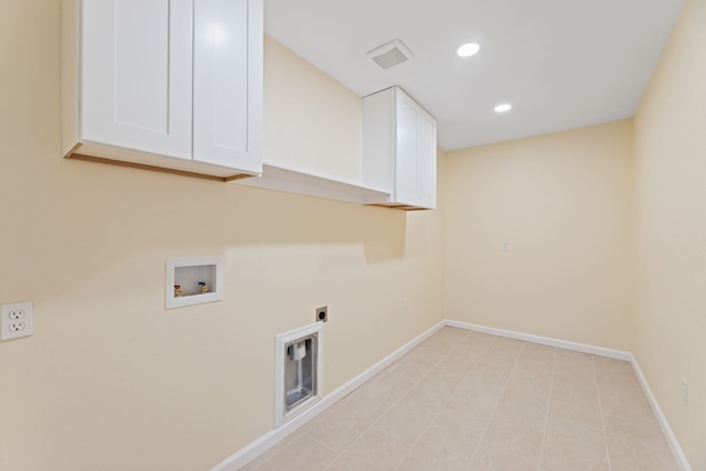 laundry room with baseboards, recessed lighting, cabinet space, electric dryer hookup, and washer hookup