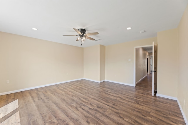 unfurnished room with dark wood finished floors, recessed lighting, baseboards, and ceiling fan