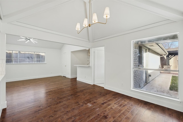 spare room with hardwood / wood-style floors, an inviting chandelier, vaulted ceiling with beams, and baseboards