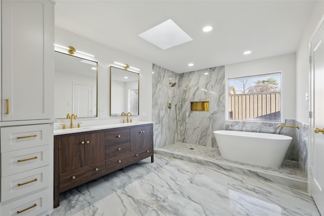 bathroom with a marble finish shower, double vanity, a skylight, a sink, and marble finish floor